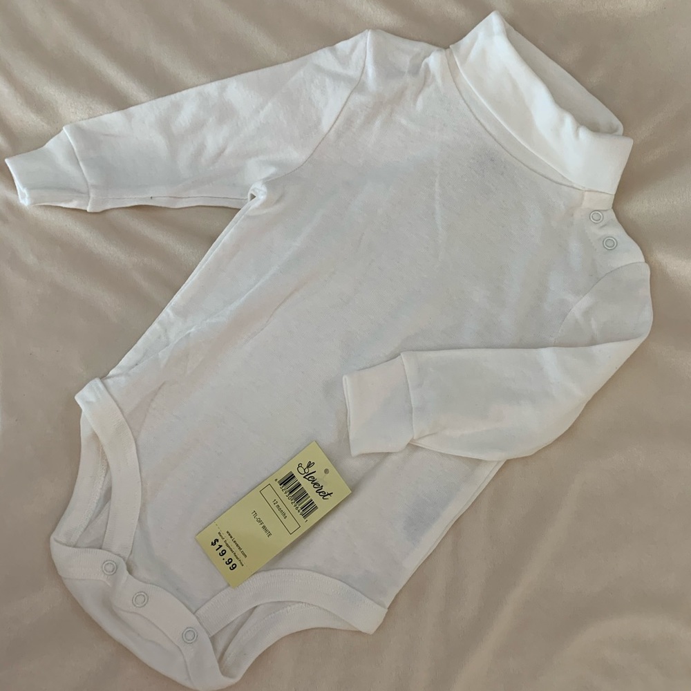 Baby turtleneck made for layering. NWT. Off white